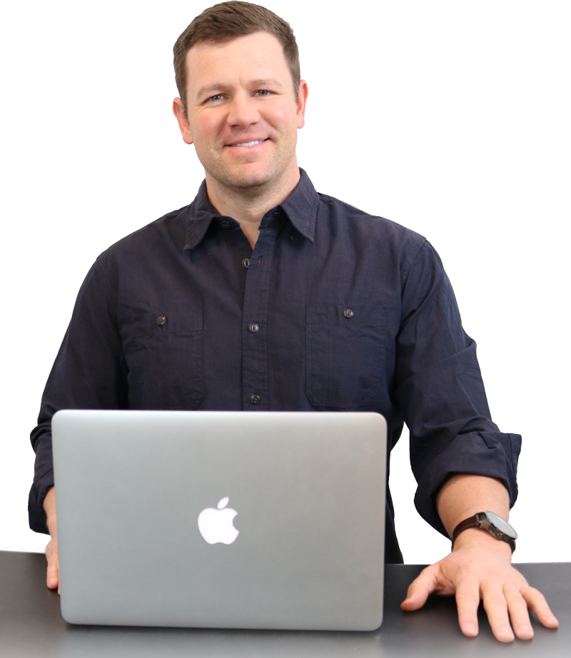 Nate Hansen, founder of SuperfastCPA, seated behind his laptop